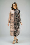 Woman wearing dual tone long batik dress with beige and black handmade batik print by Reyona