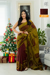Woman wearing olive green and maroon handcrafted cotton batik saree – Reyona ethnic wear