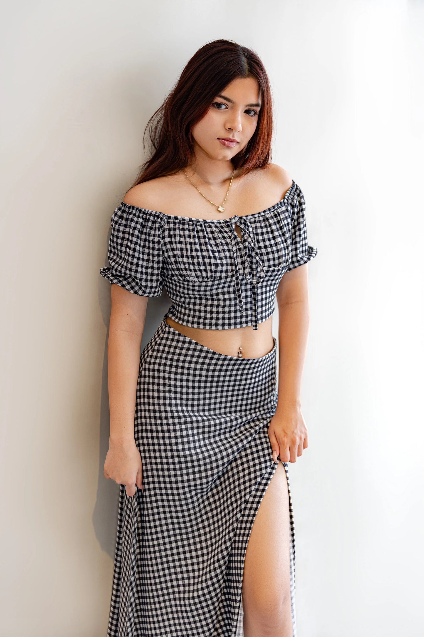 Front view of black white check co ord set with maxi skirt