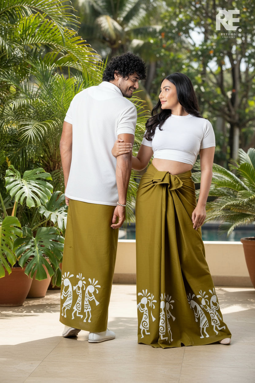 Couple wearing olive green handcrafted printed unisex sarong and lungi with white tribal batik art design – Reyona Clothing Australia