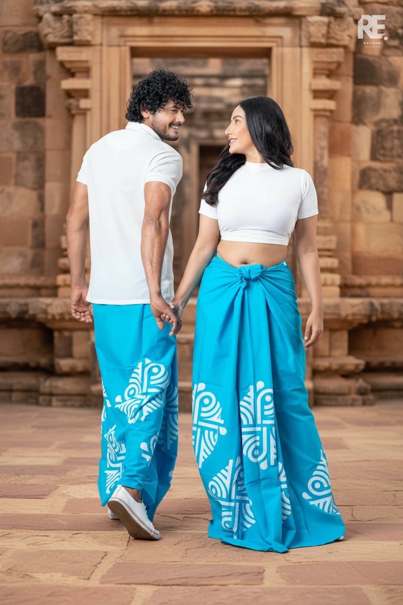 Couple wearing handcrafted sky blue printed unisex sarong and lungi with white tribal batik art design – RE 0088