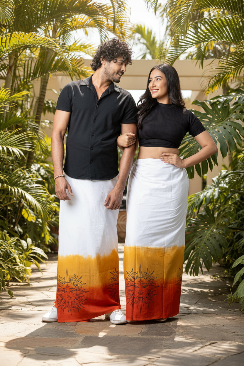Man and woman wearing matching handmade white, yellow, and orange unisex sarongs with sun motif prints, from Reyona Clothing – RE-0083
