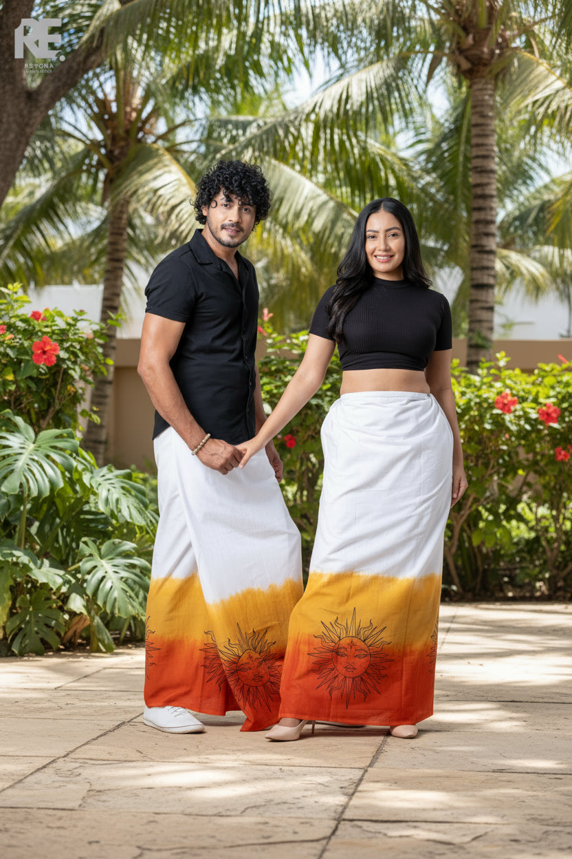 Man and woman wearing matching handmade white, yellow, and orange unisex sarongs with sun motif prints, from Reyona Clothing – RE-0083