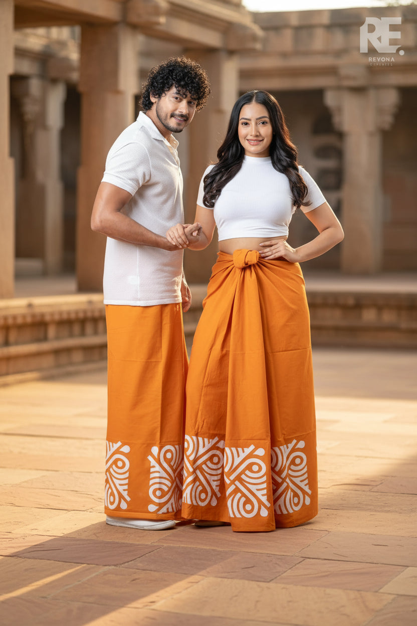 Couple wearing handcrafted orange batik unisex sarong and women’s lungi with white traditional batik art prints – RE-0089