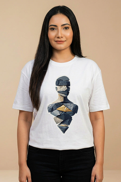 Close-up of the abstract stone sculpture graphic printed on a white oversized unisex T-shirt by REYONA.