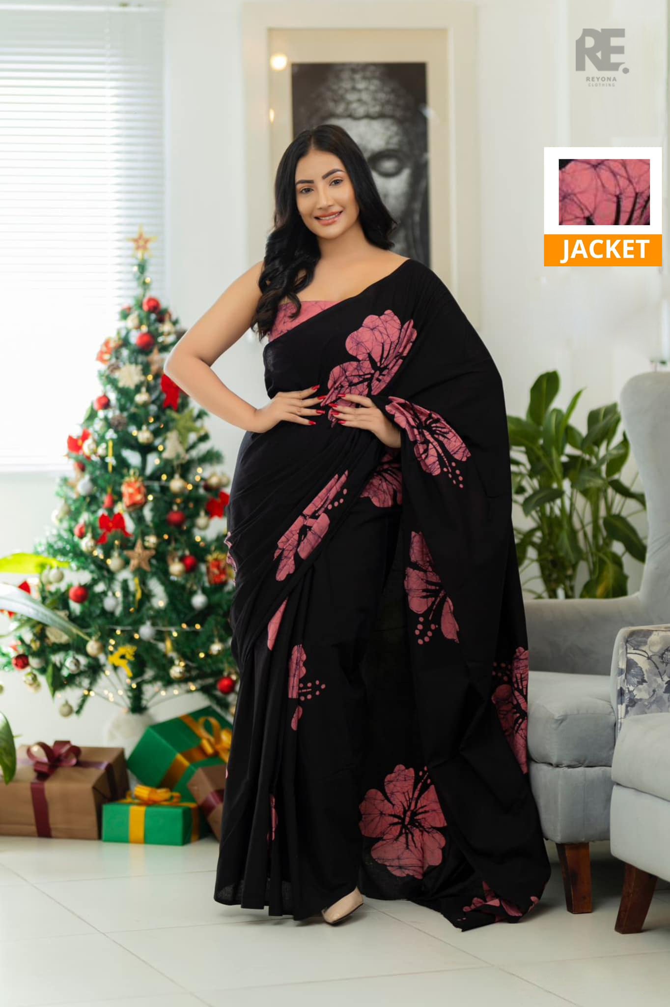 Woman wearing black and pink handcrafted cotton batik saree – Reyona