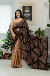 Woman wearing black and beige handcrafted cotton batik saree – Reyona ethnic wear