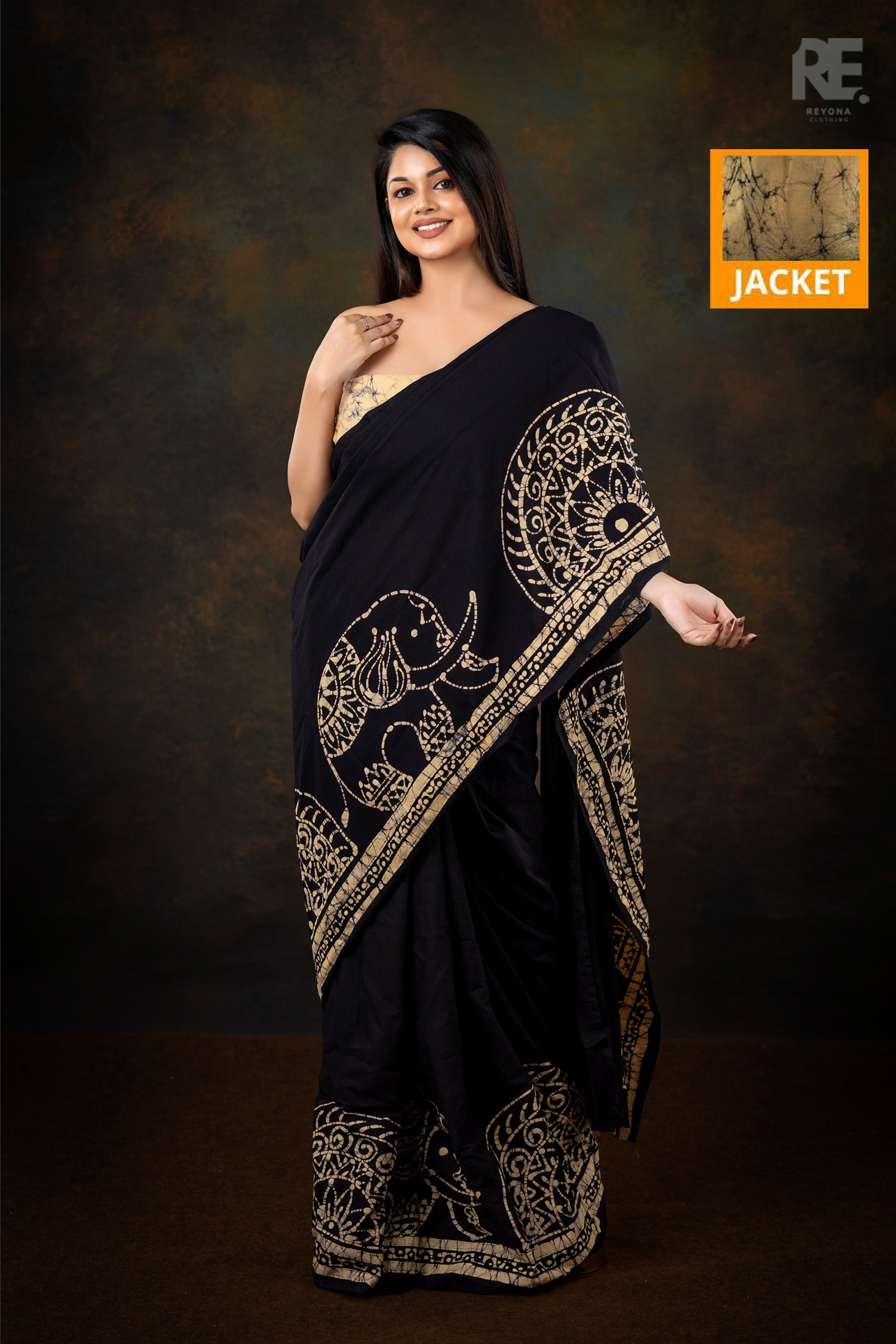 Woman wearing black and gold handcrafted cotton batik saree – Reyona ethnic wear