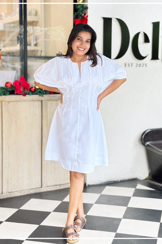 Cannes white mini dress with notched neckline and puff sleeves