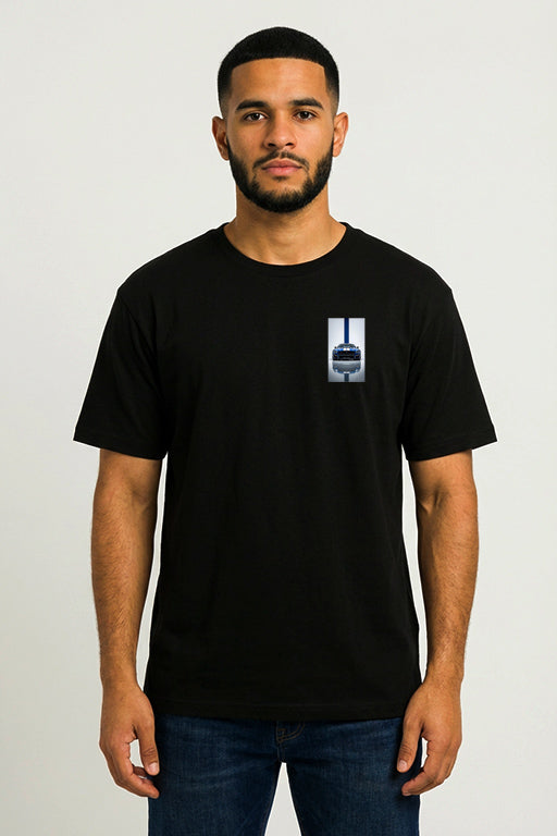Male model wearing a black oversized unisex Ford Mustang Shelby GT500 graphic T-shirt with a blue Mustang chest design.