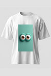 White oversized unisex T-shirt featuring a playful 3D eyes graphic on a turquoise background by REYONA.