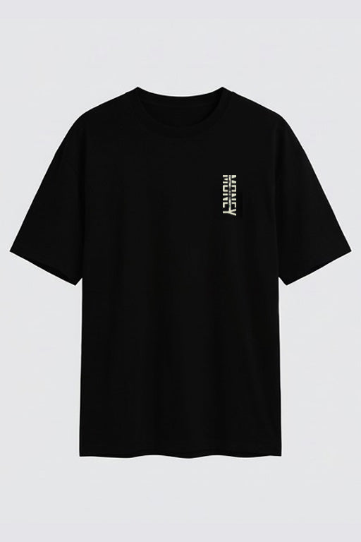 Oversized unisex black graphic T-shirt with small vertical typographic chest print worn by female model – RE-0133
