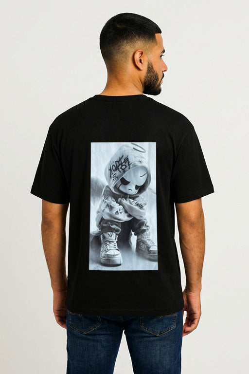 Oversized unisex black graphic T-shirt with small monochrome chest print worn by male model – RE-0119