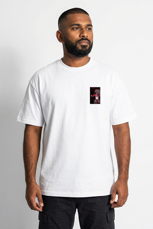 Oversized unisex white graphic T-shirt with small traditional character chest print worn by male model – RE-0120